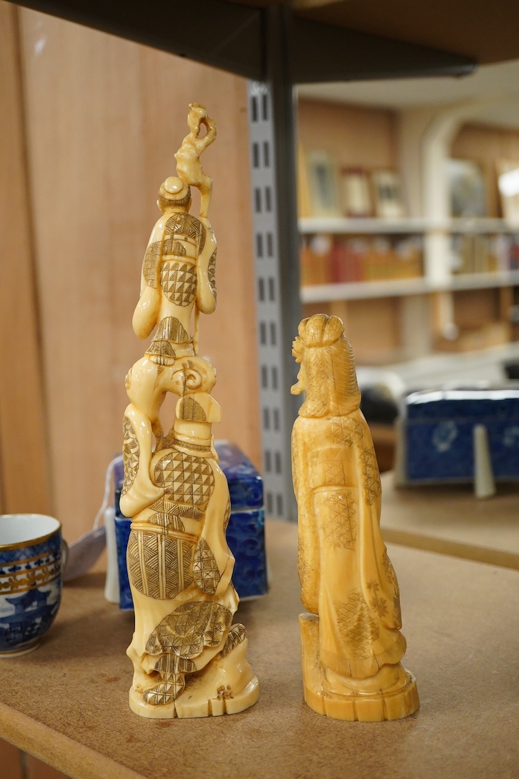 Two early 20th century Japanese walrus ivory carvings, 26cm
